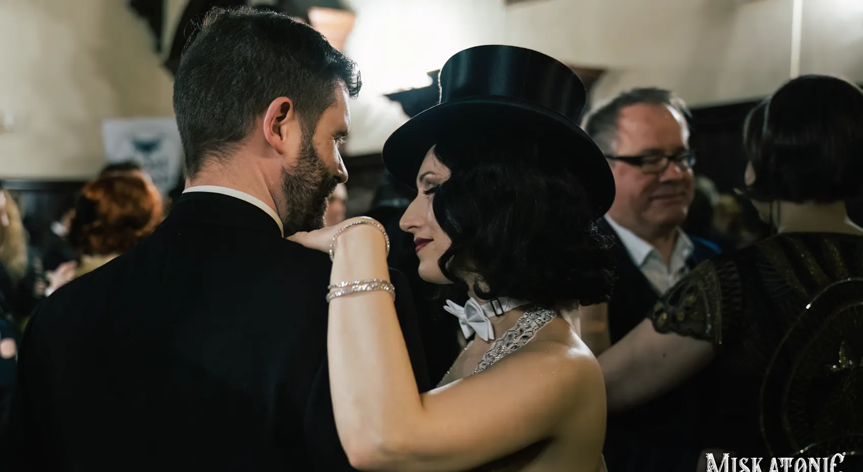 Dancers embrace at the ball